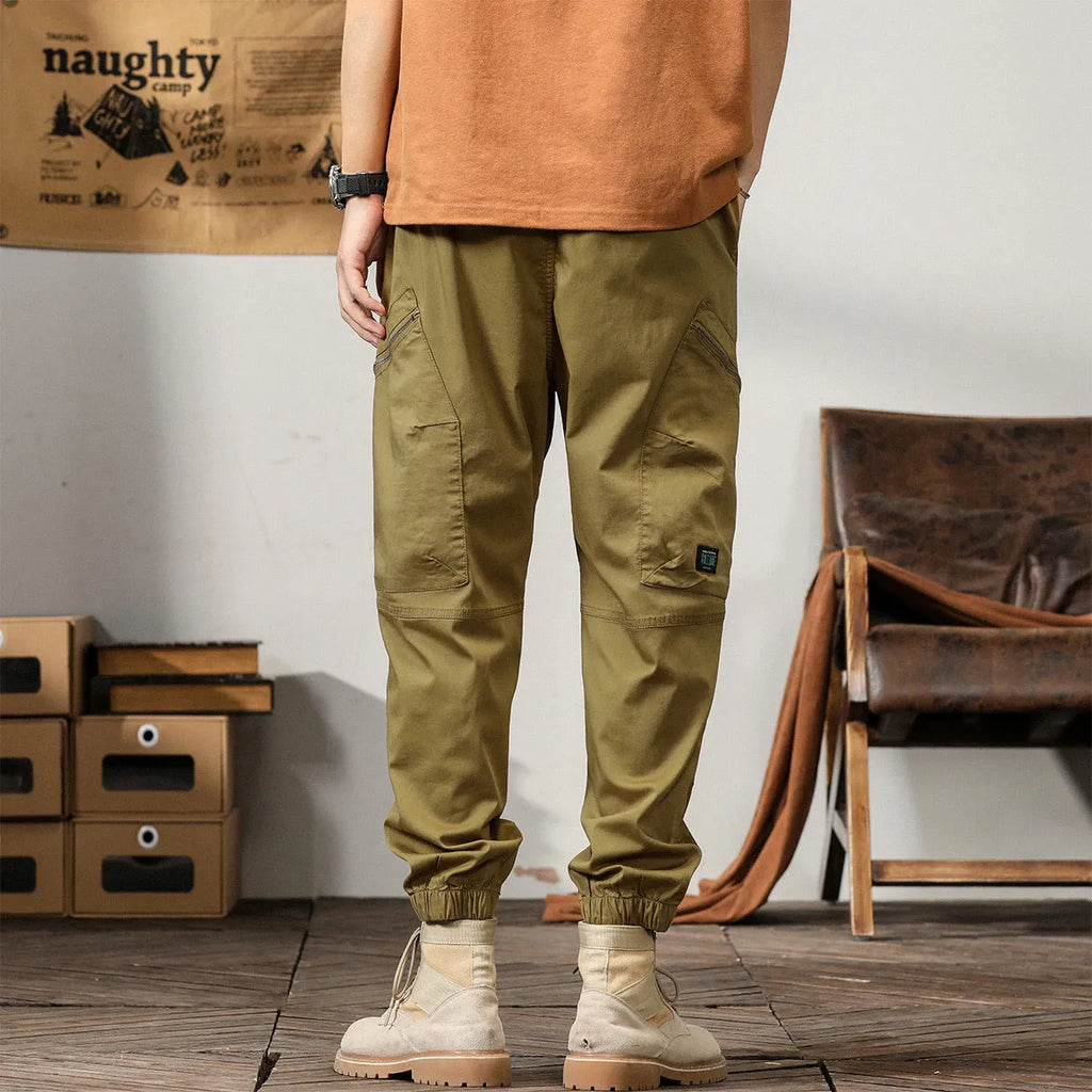 Men's loose cotton harem style trousers with tapered ankle banding in khaki colour