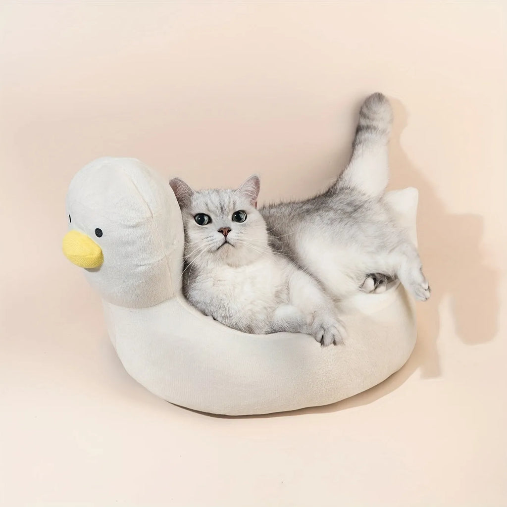 Blue duck-shaped pet bed sofa for small dogs and cats on white background