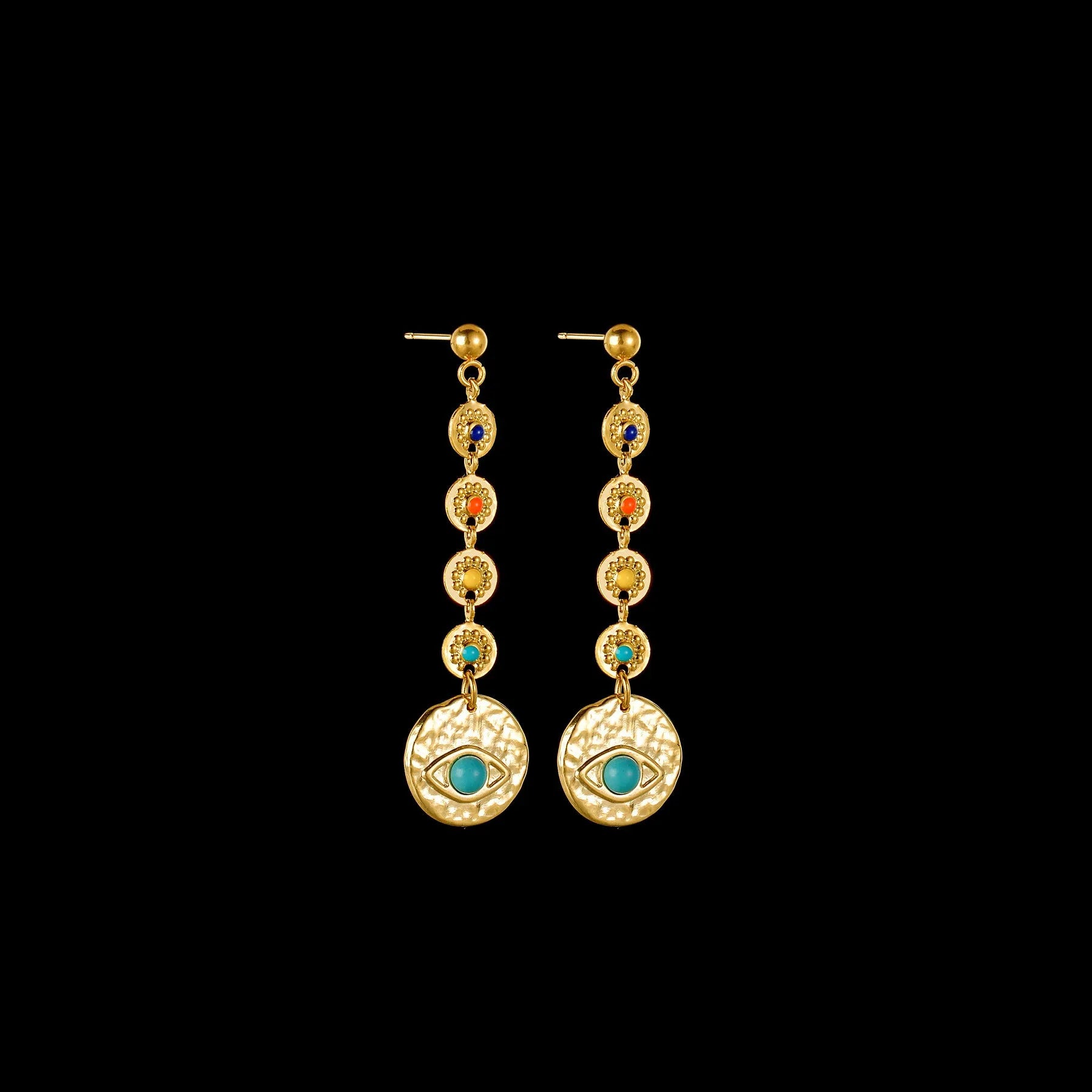 Three pairs of geometric stainless steel earrings showing Eight Awn Star, Eye, and Shell Sun designs