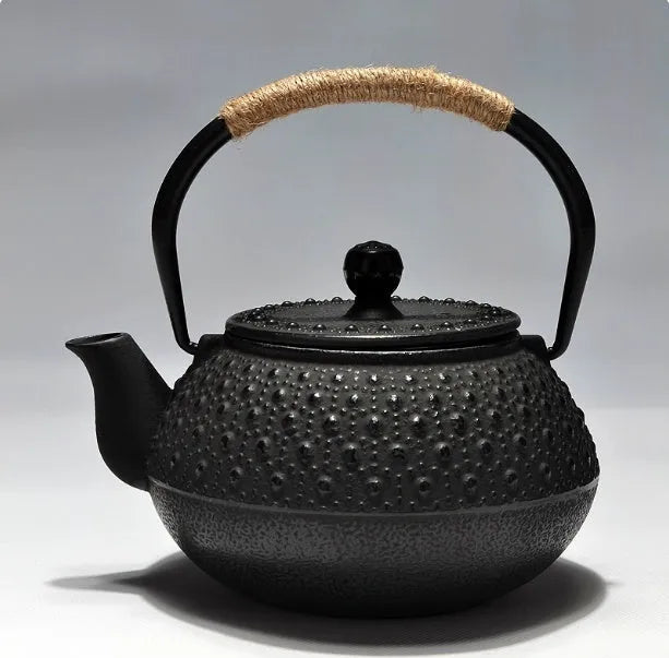 Japanese-style cast iron teapot in a choice of ten patterns, shown in 0.9L size.