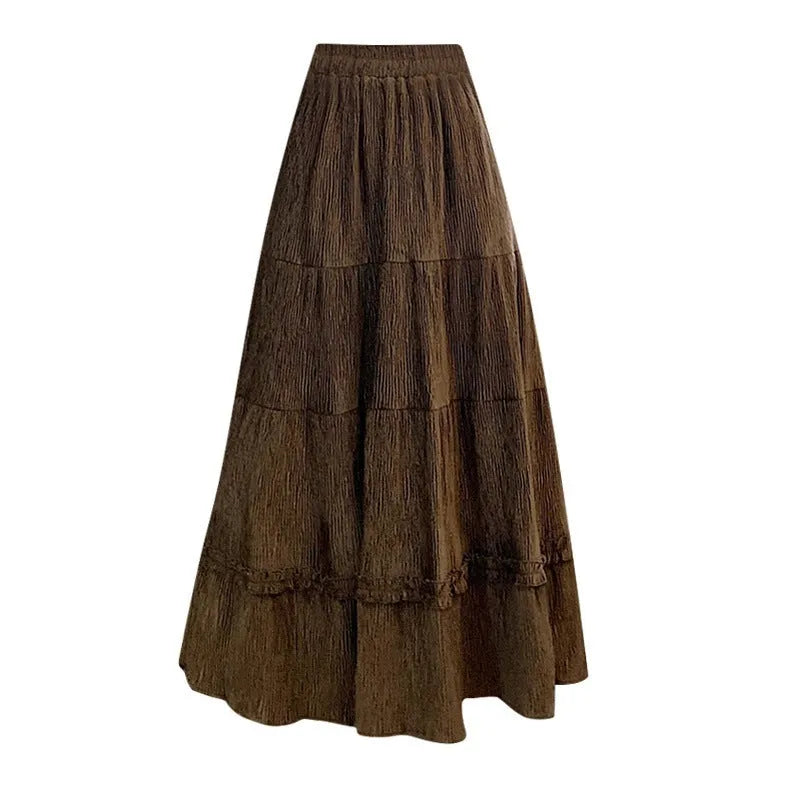 Women's solid colour corduroy A-line midi skirt with an elastic waistband shown in beige.