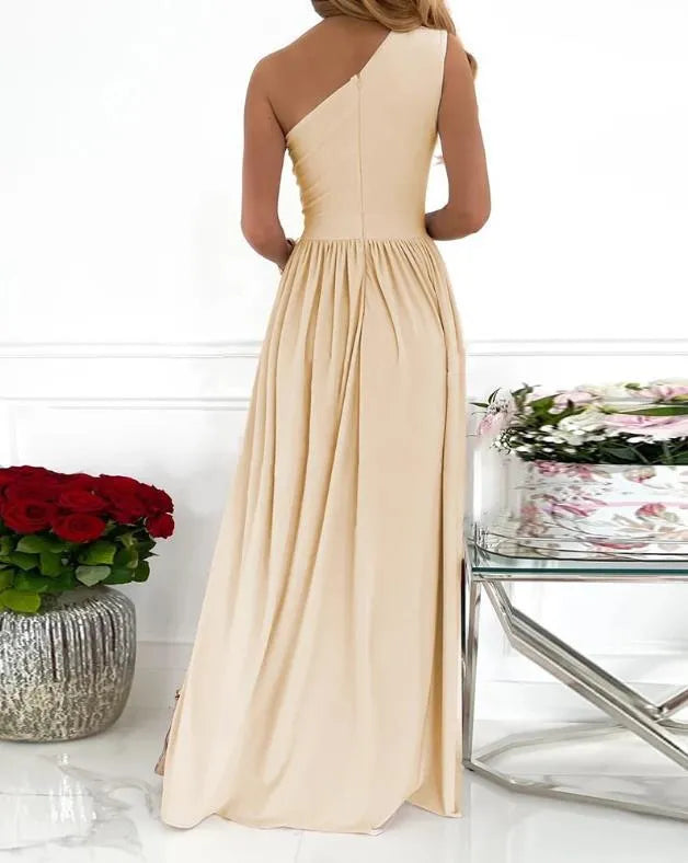 Women's apricot one shoulder maxi dress with high leg split and sleeveless cutout design.