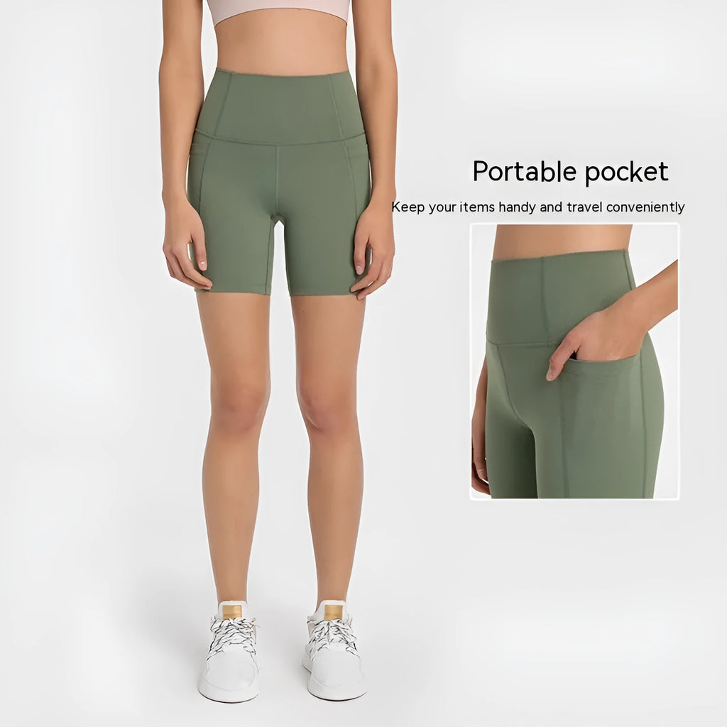 Women's tight-fitting mid-length sport shorts in black cotton blend fabric.