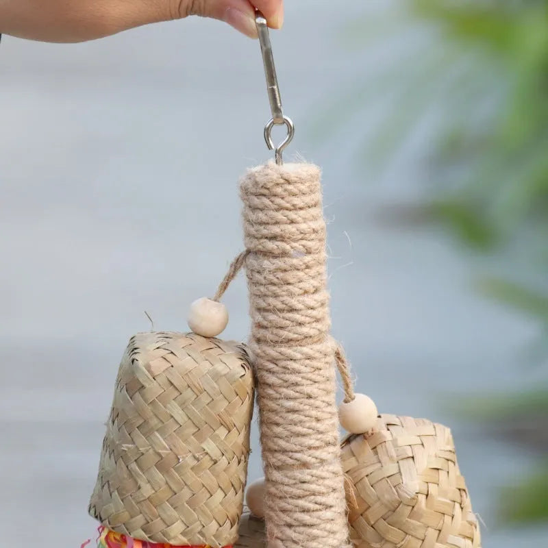 Colourful shredded paper bird toy with wood pieces and sisal fibres for parrots