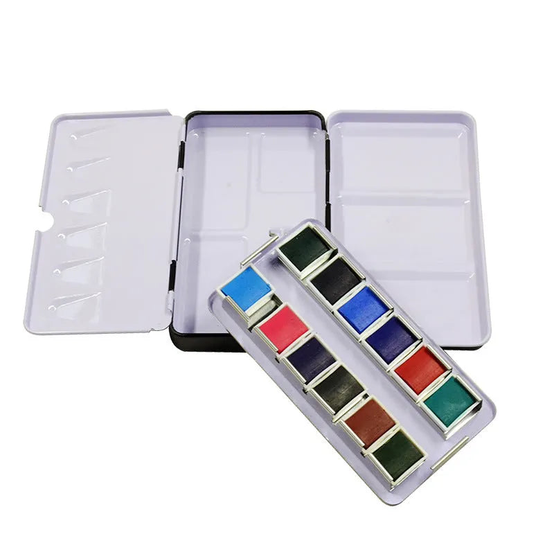 Square tinplate metal paint box for solid watercolour pigments in three folding sizes.