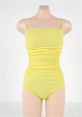 Blue sling style one-piece swimsuit with belly pleating on a mannequin