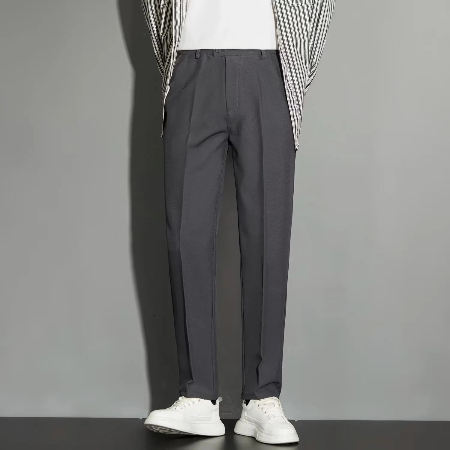 Men's straight ankle-length suit trousers with spring draping effect in chemical fibre blend fabric
