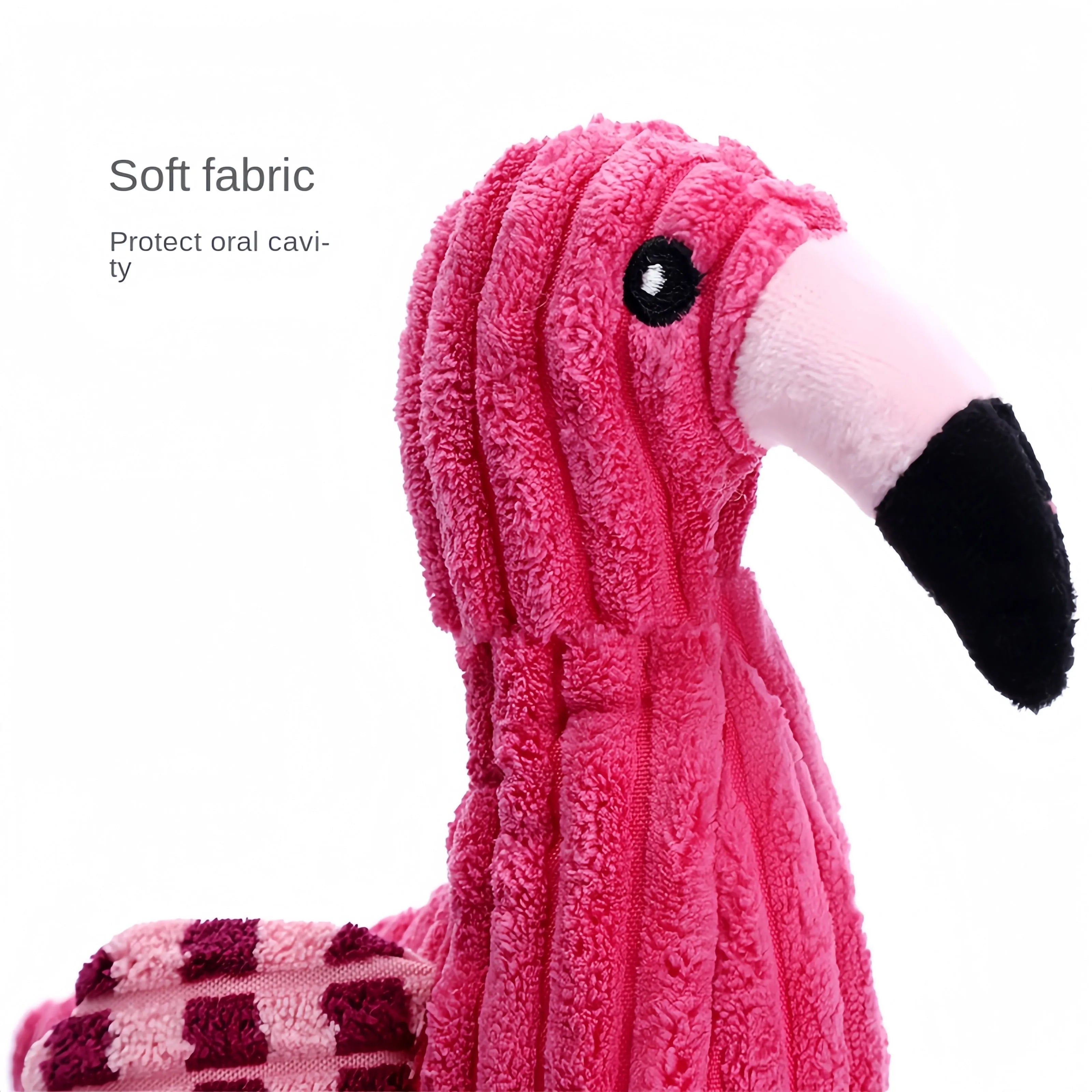 Pink corduroy animal-shaped squeaky plush dog toy on a plain background