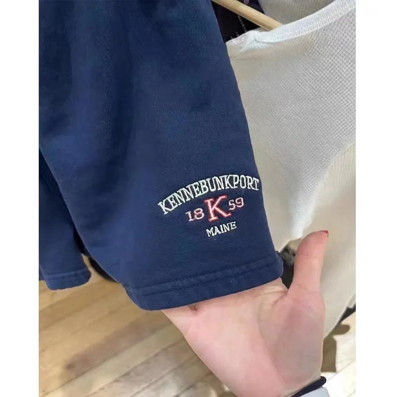 Women's dark blue cotton sports shorts with white flag embroidery design