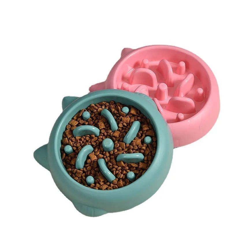 Green slow feeder dog bowl with raised bone-shaped ridges inside