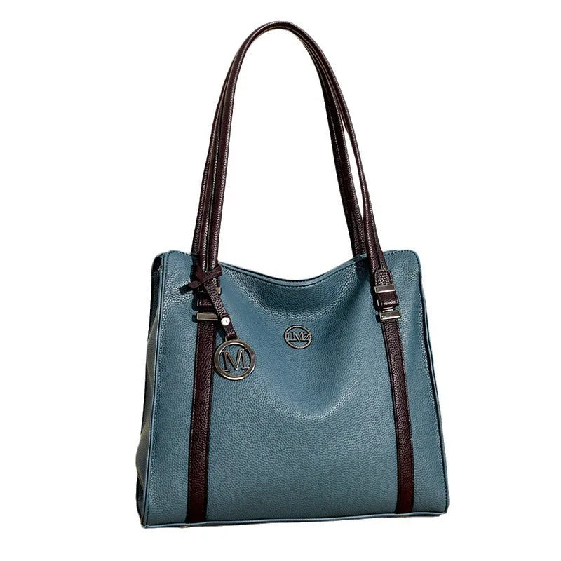 Woman holding a large soft black PU leather retro crossbody bag with double shoulder straps.