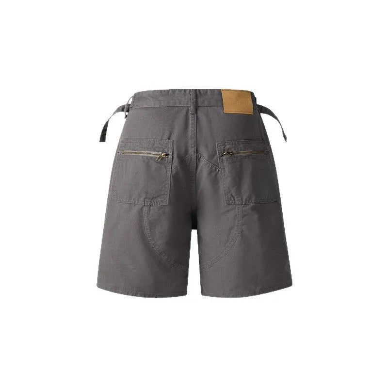 Retro workwear shorts in washed cotton with loose fit and fifth pants length design