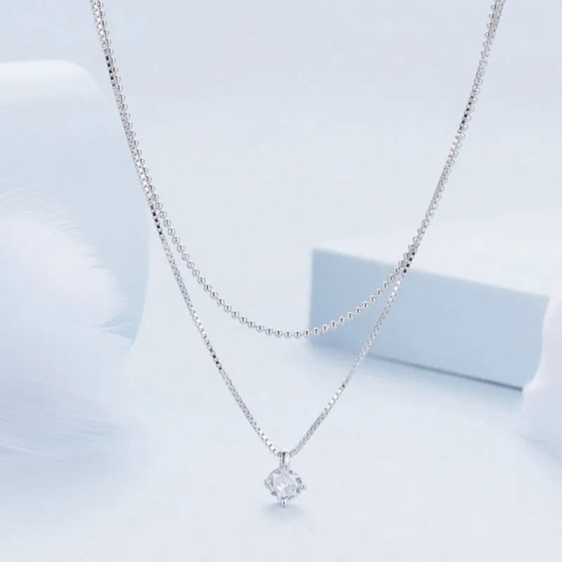 Silver colour double-layer necklace with pearl chain and pendant made from 925 sterling silver