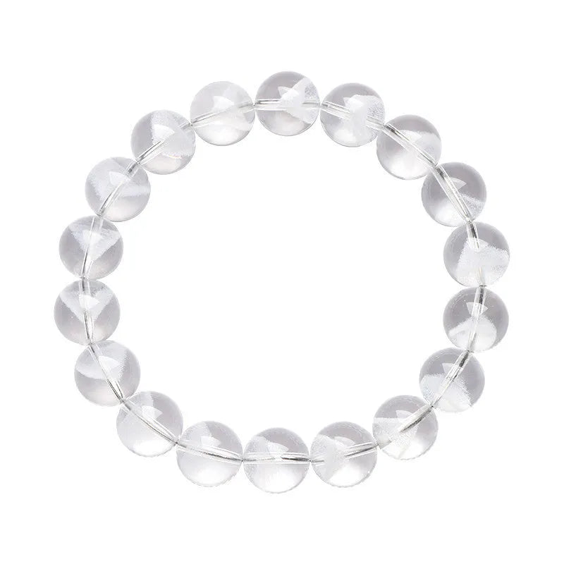 Women's natural white crystal pyramid ghost bracelet with Ruyi charm showing bead texture