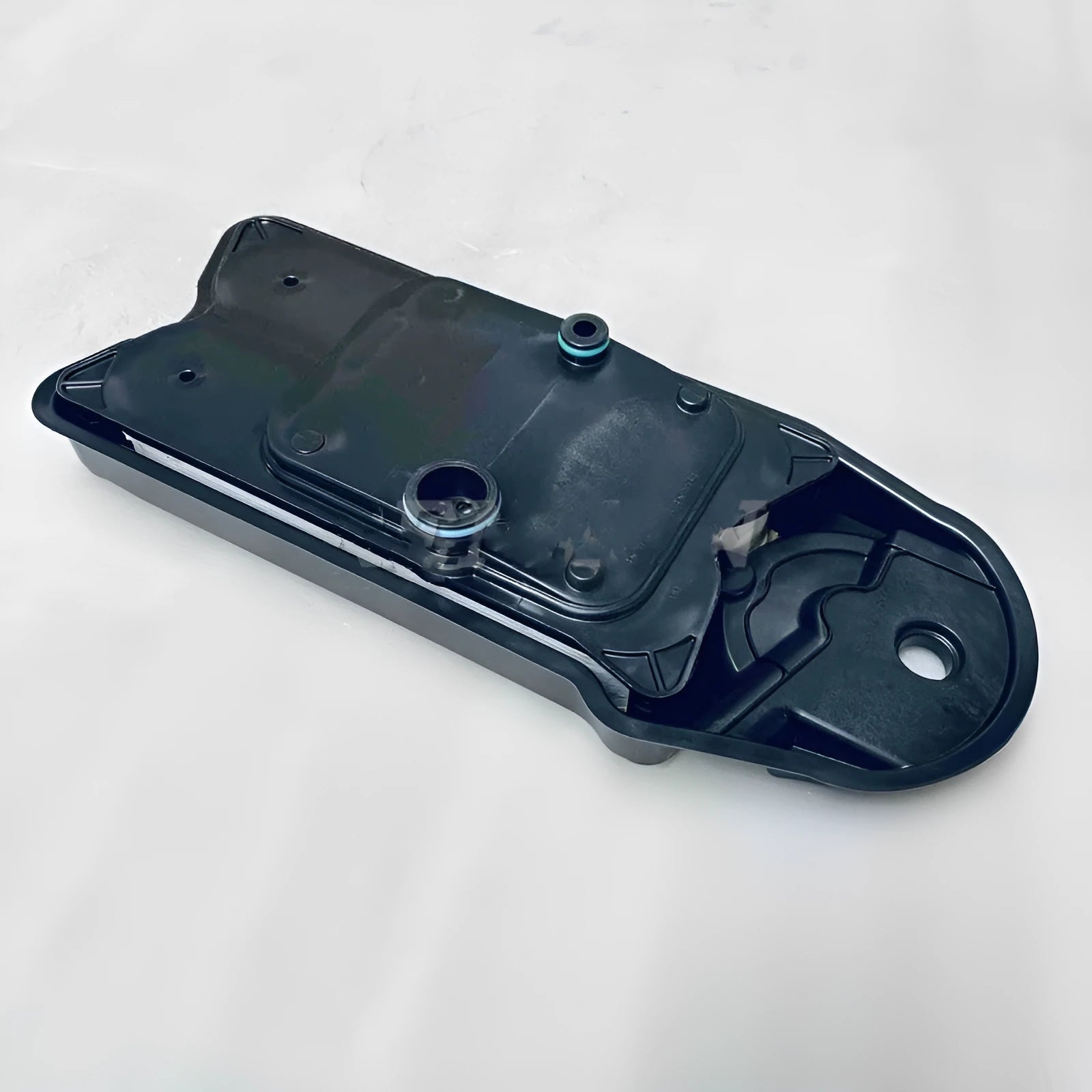 Black automotive crankcase ventilation filter for engine blow-by gas separation.