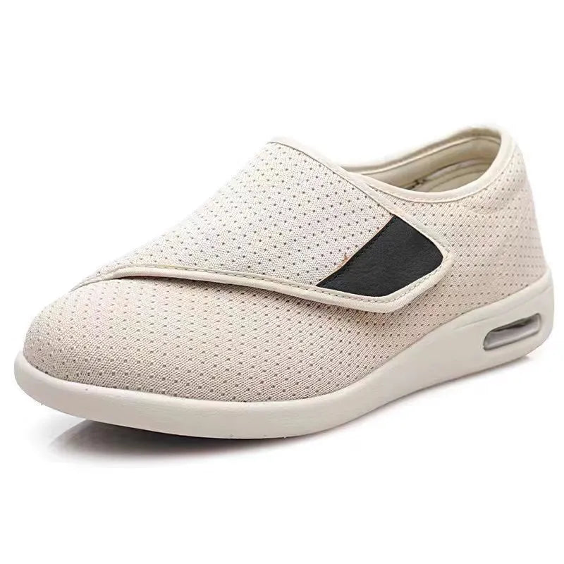 Casual beige slip-on shoes with a round toe and rubber sole for men and women.