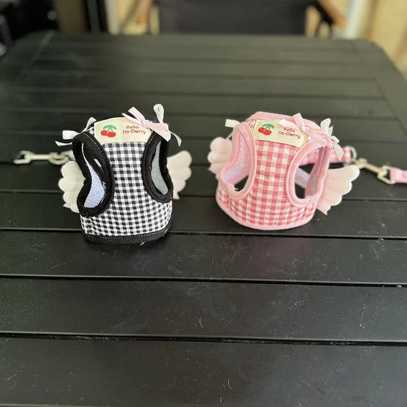 Small dog harness with chest and back attachments and cotton hand-holding rope in pink or black colours