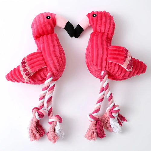 Pink corduroy animal-shaped squeaky plush dog toy on a plain background
