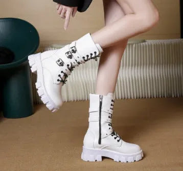 Black mid-calf women's knight boots with metal buckle and side zipper on a white background.