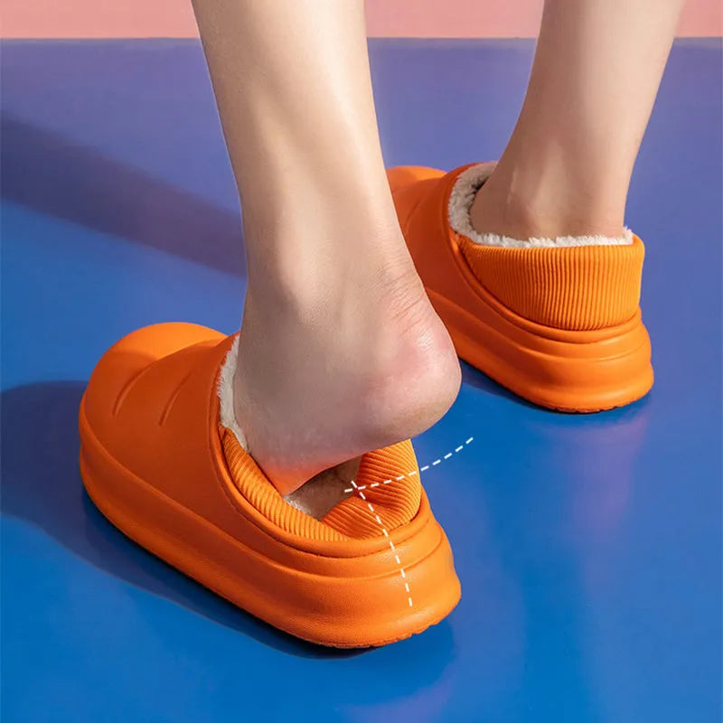 A pair of green EVA couple slippers with plush lining, shown as indoor house shoes and outdoor garden overshoes.