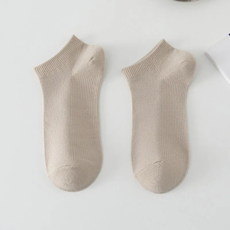 Solid colour low-cut polyester boat socks for men, shown in one of six available colour variants.