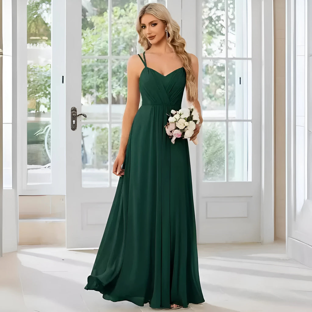 Women's long pleated sleeveless A-line dress in light green, shown on a mannequin.