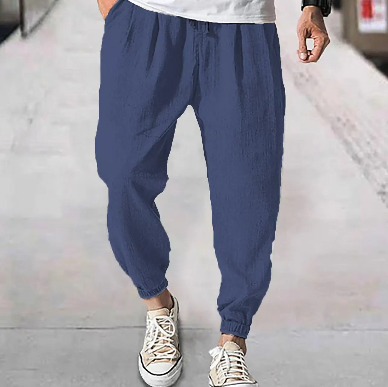 Men's loose cotton summer trousers with banded ankle cuff in light green colour