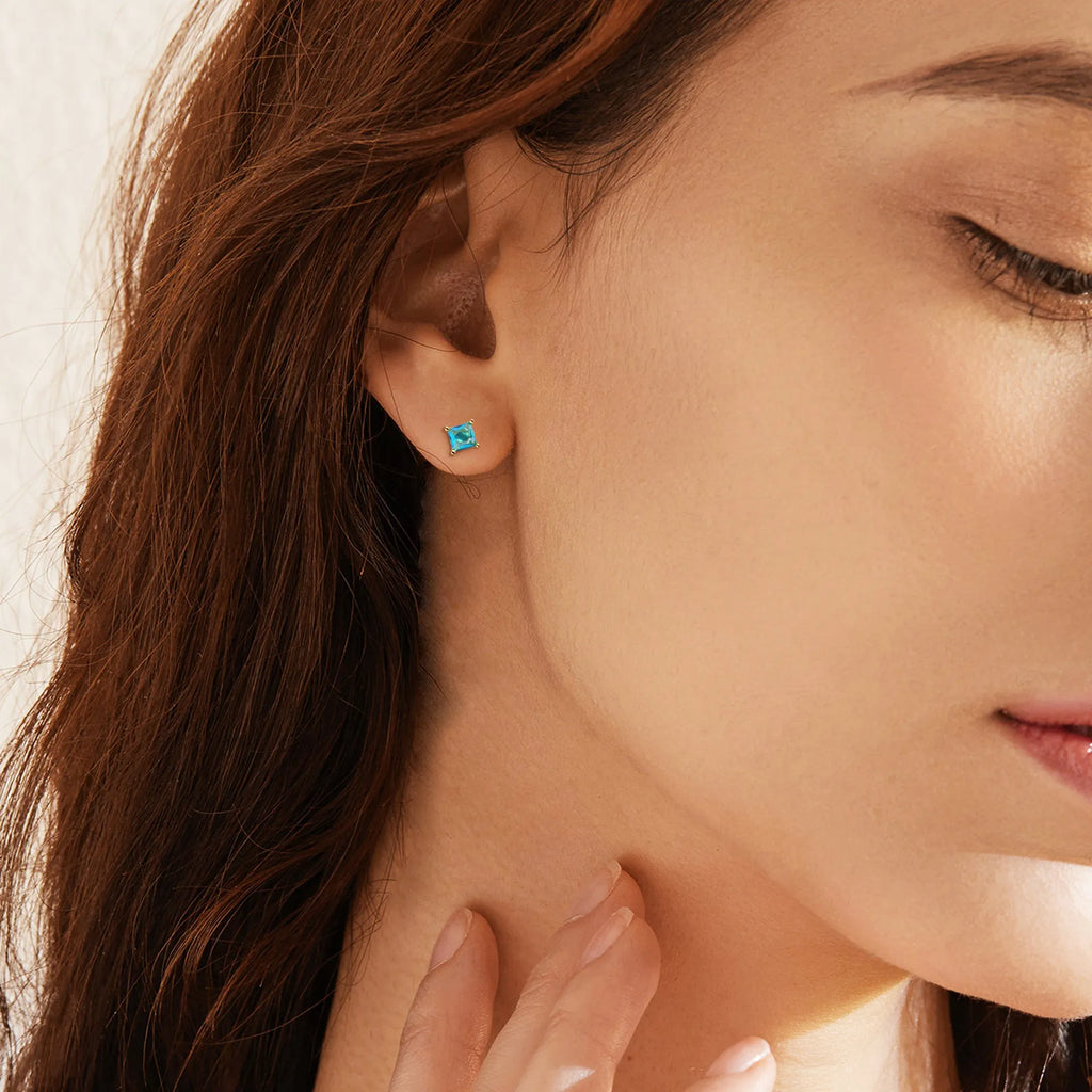 Brass gold-plated drop earrings with pear-shaped candy-colour zircon stones on copper construction
