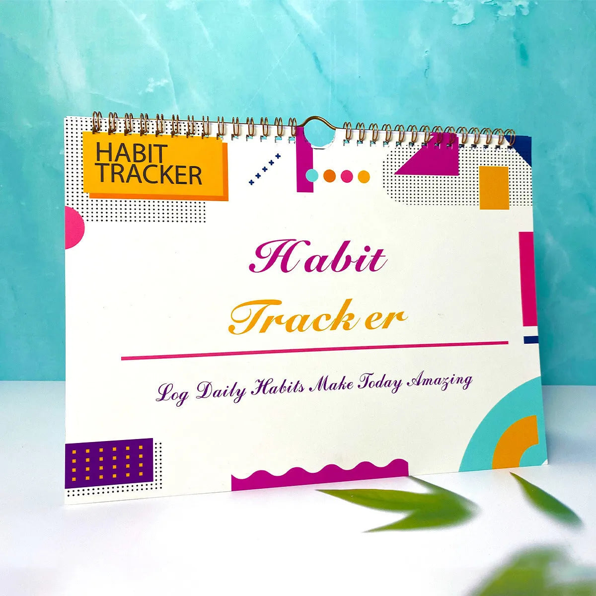 English habit tracking book with 12 pages measuring 21cm by 28cm