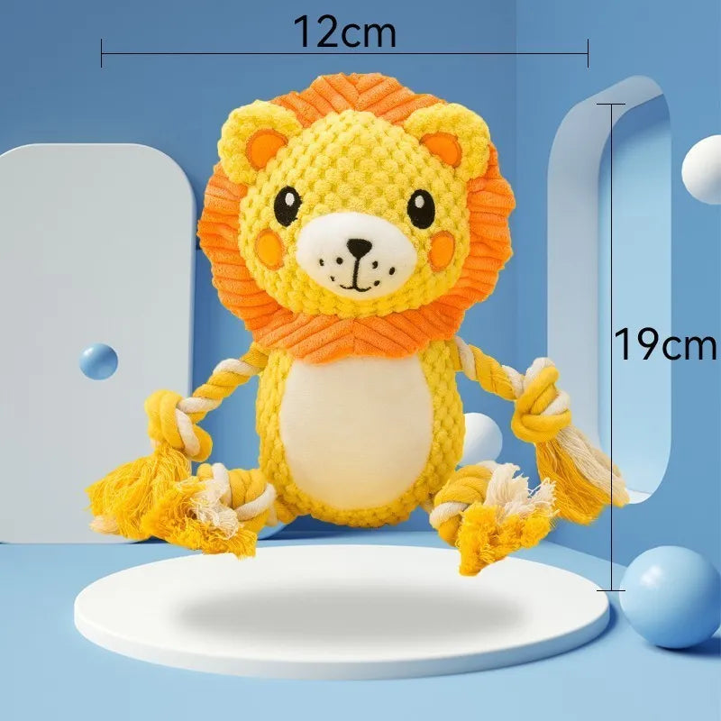 Lion and monkey soft plush squeaky dog toys side by side.