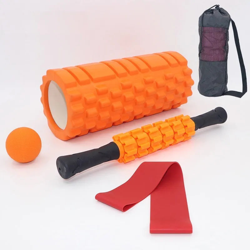 Black foam massage roller stick with six textured sections measuring 33cm long