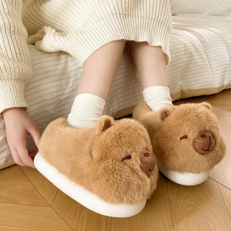 Light brown women's winter slippers with plush upper and oversleeve design