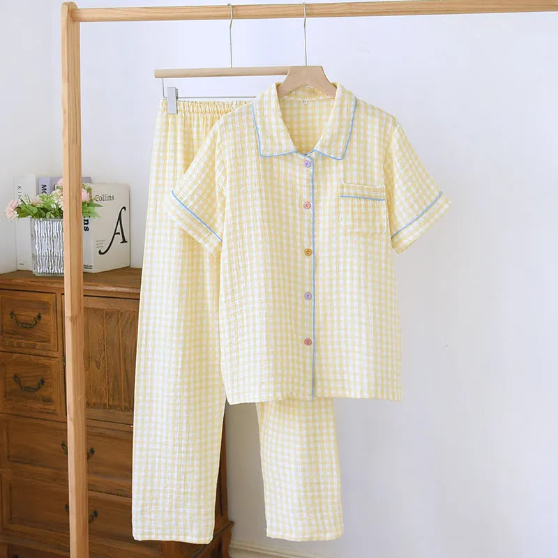 Women's yellow plaid crepe cotton short-sleeved top and loose trouser set for summer.