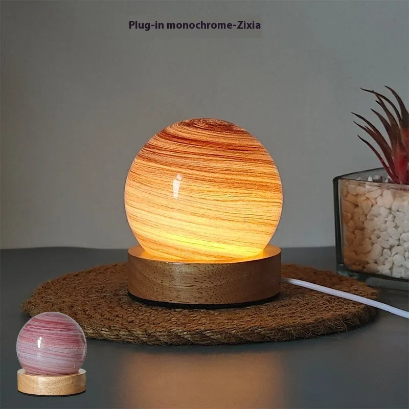 Planet-themed USB plug-in night light with three-colour dimming on a base, showing 80x90mm size.