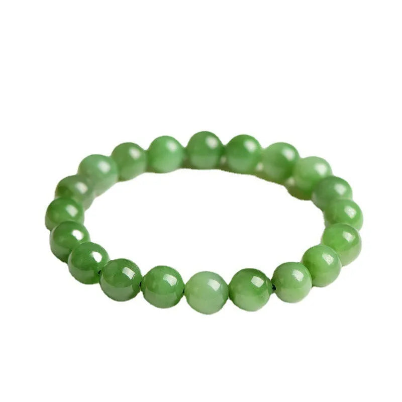Polished Hetian jade jasper ball bracelet showing natural stone beads in multiple size options on a wrist.