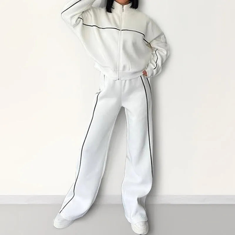Casual two-piece suit set with a grey hoodie and striped lace-up trousers on a hanger