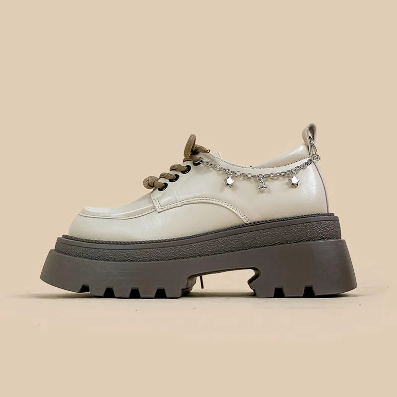 White Mary Jane platform shoes with chunky heel and front lace-up fastening