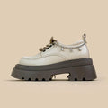 White Mary Jane platform shoes with chunky heel and front lace-up fastening