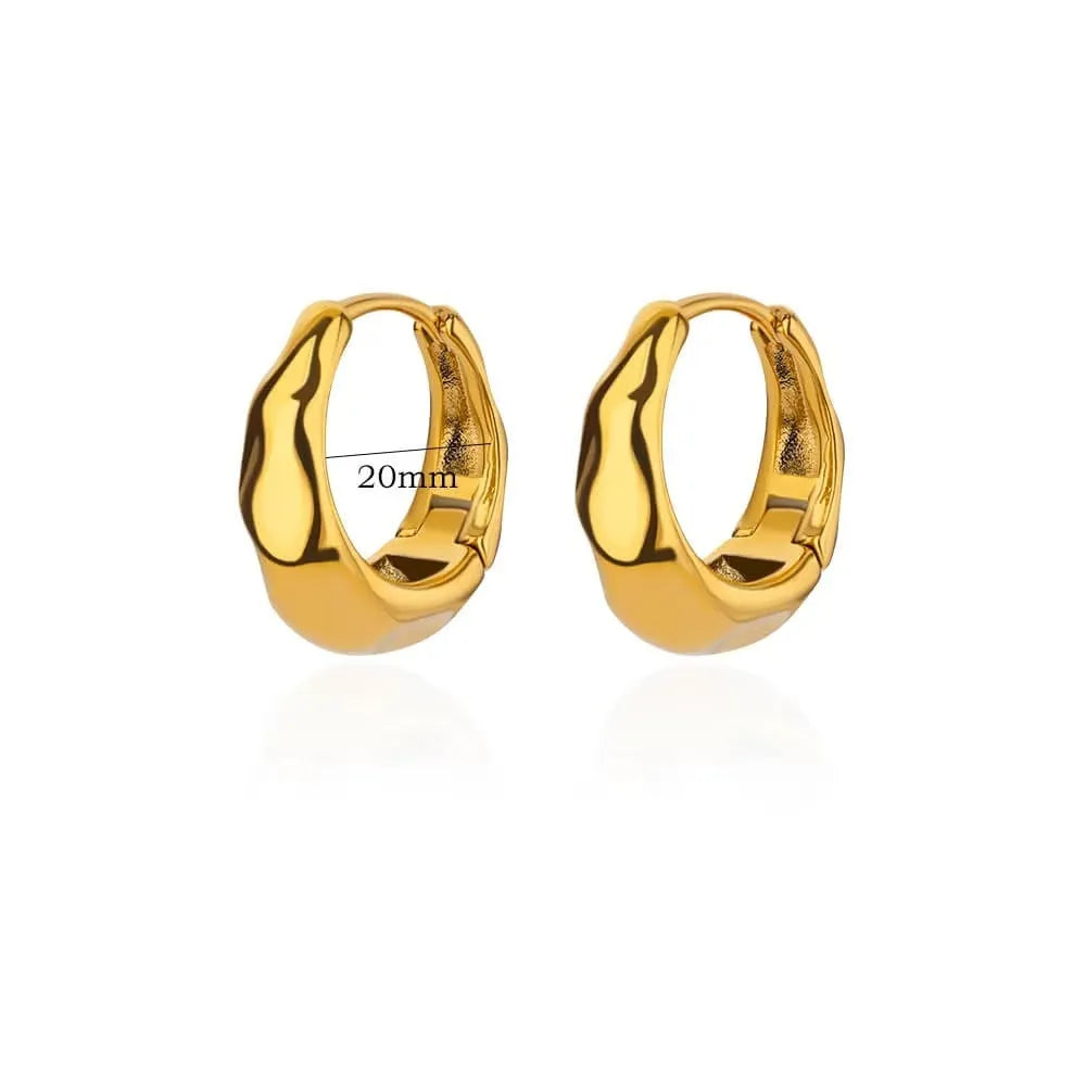 Geometric butterfly earrings for women in copper alloy with heart, bow, and star shapes.