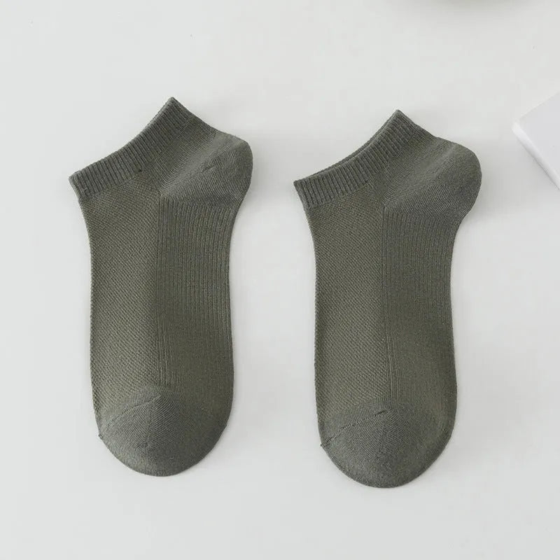 Solid colour low-cut polyester boat socks for men, shown in one of six available colour variants.