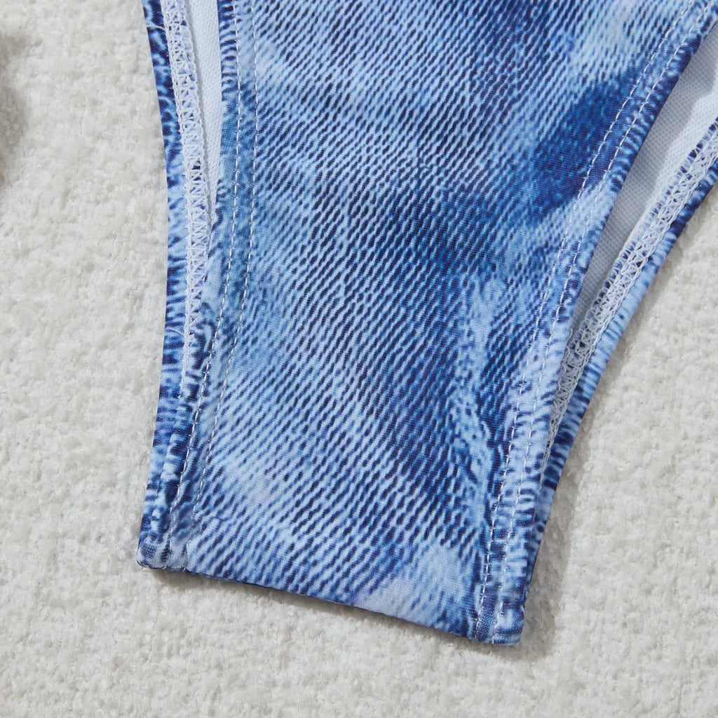 Women's denim blue printed bikini set with adjustable straps on mannequin