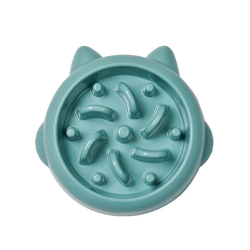 Green slow feeder dog bowl with raised bone-shaped ridges inside