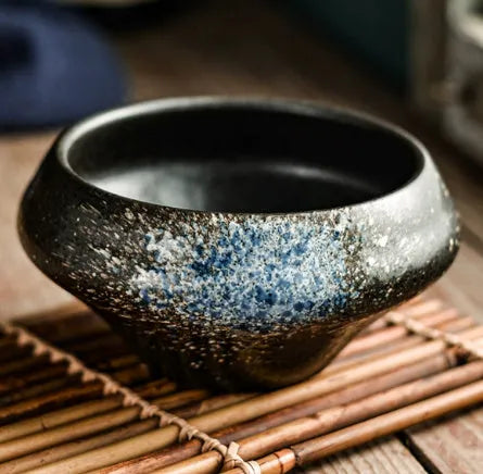 Porcelain Japanese soup bowl in stone conch shape with underglaze finish