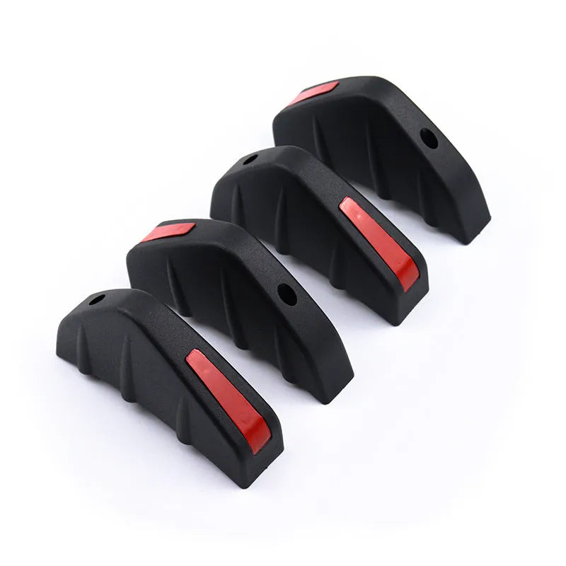 Set of four black ABS plastic triangle rear spoilers for car bumper, measuring 15cm wide, with screws and adhesive tape.