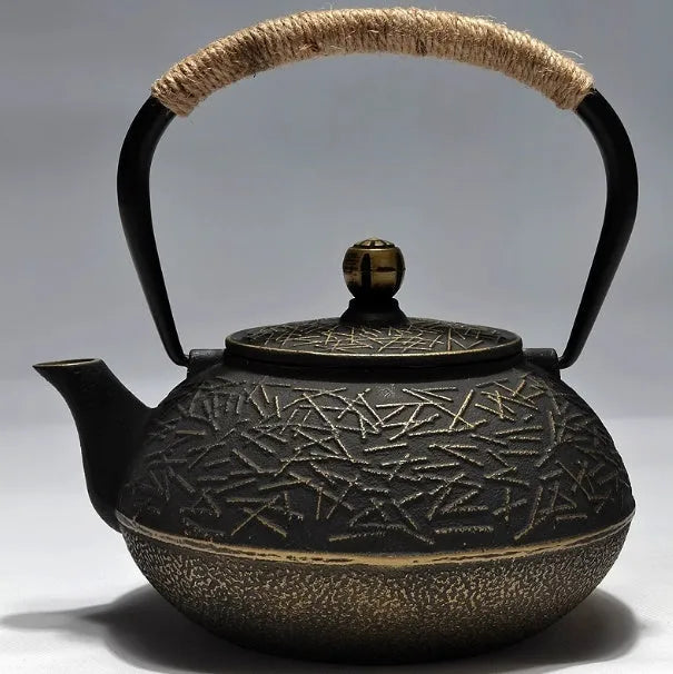 Japanese-style cast iron teapot in a choice of ten patterns, shown in 0.9L size.