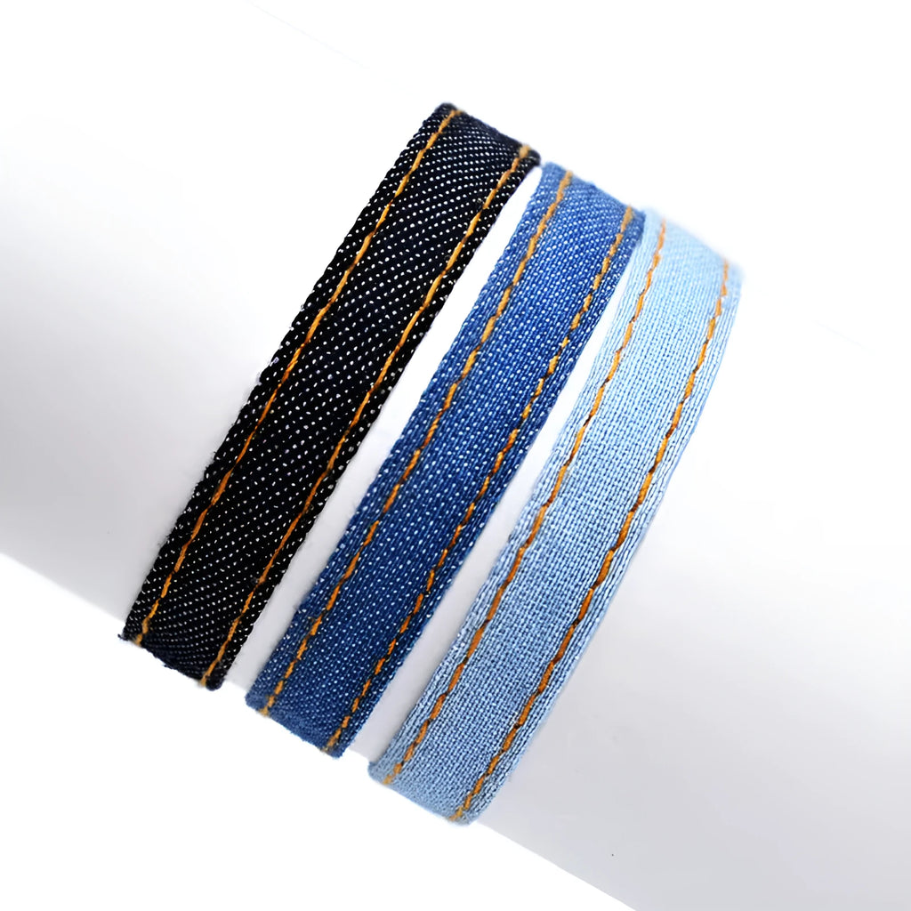 Denim fabric bracelet carrying strap in unisex design with mixed materials and cute styling