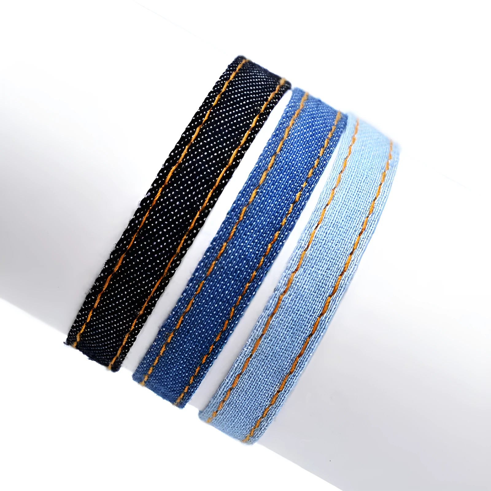 Denim fabric bracelet carrying strap in unisex design with mixed materials and cute styling