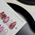Hand-painted three-dimensional embossed nail art patches in candy colours, showing almond shape.