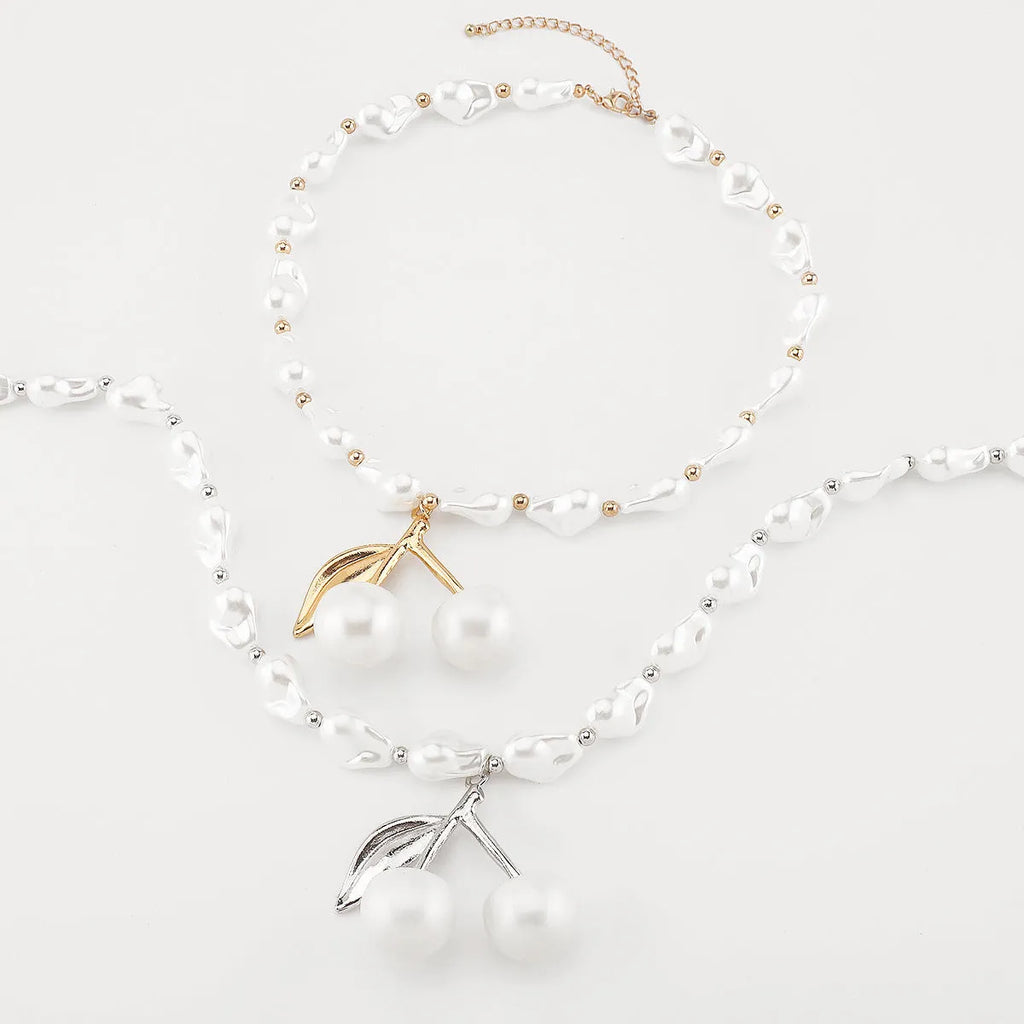 Women's adjustable pearl cherry fruit necklace with geometric pendant on 51-60cm chain