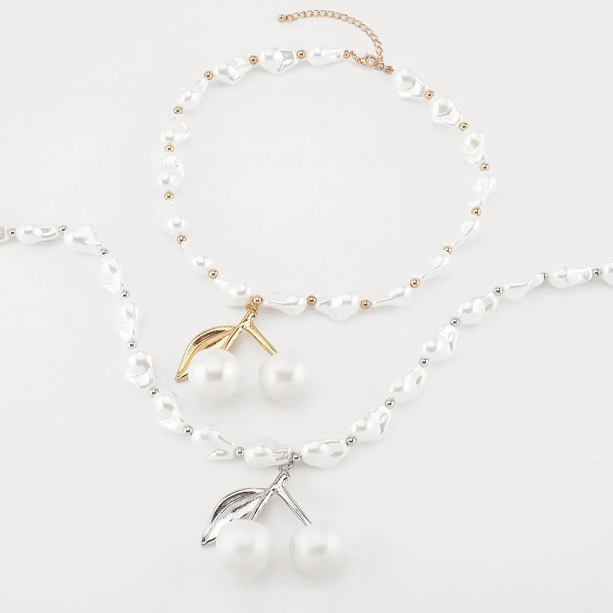 Women's adjustable pearl cherry fruit necklace with geometric pendant on 51-60cm chain
